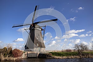 The old Dutch windmills, Holland, rural expanses . Windmills, the symbol of Holland.