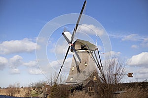 The old Dutch windmills, Holland, rural expanses . Windmills, the symbol of Holland.