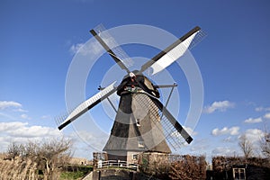 The old Dutch windmills, Holland, rural expanses . Windmills, the symbol of Holland.