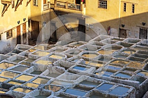 Old dye reservoirs and vats in a traditional tannery