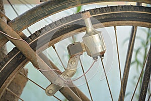 Old dynamo of a bicycle. photo