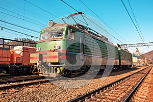 Old electric locomotive on the rails