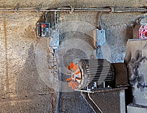 Old electric motor in abandoned factory