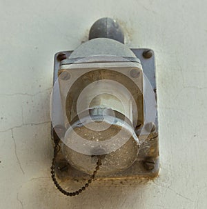 Old electric socket on the wall