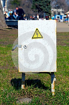 Old electrical panel on street.