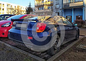 Old but elegant veteran classic sporting coupe classic newtimer car blue Toyota Celica parked