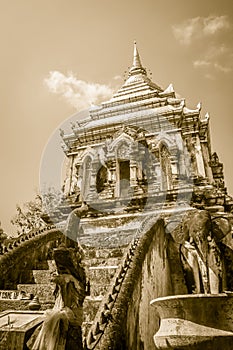 Old elephant chedi with golden top pagoda at Wat Chiang Man or Wat Chiang Mun, the oldest temple in Chiang Mai, Thailand, built in