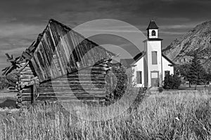 Old Emery Meeting House and settler cabin in Black and White