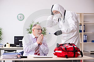 Old employee catching coronavirus at workplace