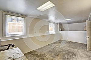 Old empty basement room with concrete floor