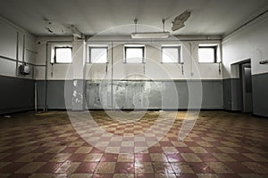 Old empty room, checkered tile floor