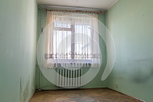 Old empty room in plattenbau building