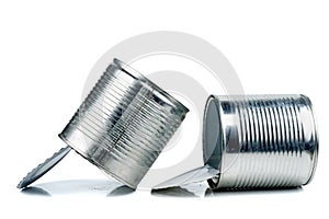 Old empty tin cans on white background