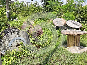 Old empty wooden cables spools