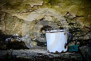 Old enamelware mug