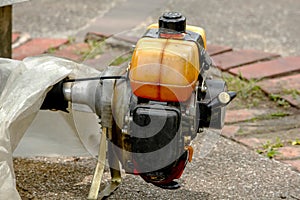 Old engine of a lawn mower.