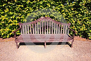 Old, English bench in the garden