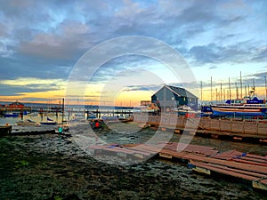 Sailing boats, sunset on English coast