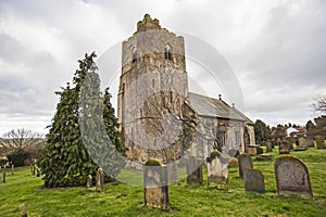 Old english rural country church in village