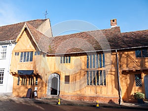 Old english winter sunlit old manor cottage house Lavenham