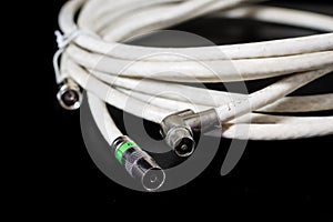 Old entangled cables, electronics and old cable connectors on a