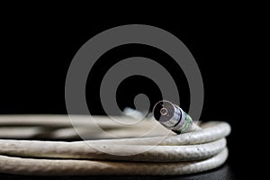 Old entangled cables, electronics and old cable connectors on a