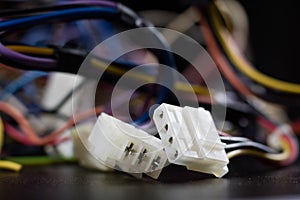 Old entangled cables, electronics and old cable connectors on a