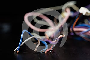 Old entangled cables, electronics and old cable connectors on a
