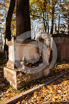 An old entombment on a cemetery photo