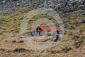 Old eroding barn in Iceland photo