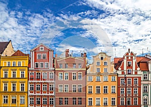 Old european tenement houses against the blue sky