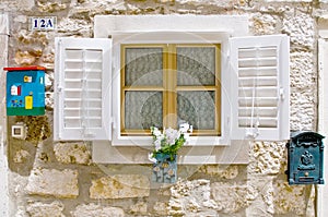 Old European window with shutters,