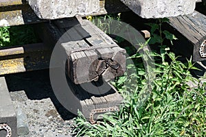 Old exchanged wooden railway sleepers stored for further use