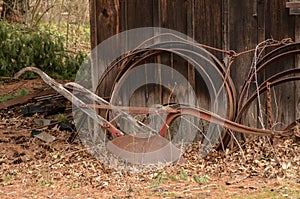 An Old Experienced Plow and Wheel Rims