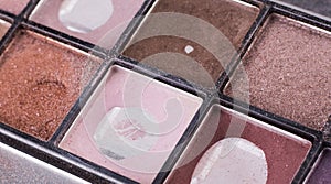 Old eye shadow beige shades used by makeup artist, macro