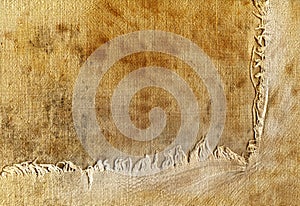 Old fabric with torn edge
