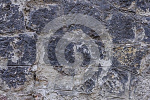 Old facade rusty pattern construction stone wall background