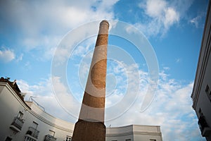 Old Factory Chimney made of Orange Bricks in Jerez de la Frontera, South of Spain photo