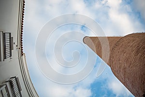 Old Factory Chimney made of Orange Bricks in Jerez de la Frontera, South of Spain photo