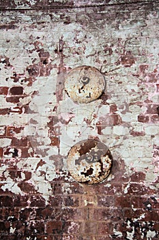Old Faded Paintwork on Brick Wall