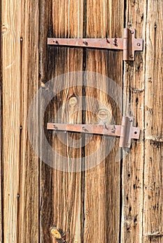 Old Faded Rustic Wood and Two Hinges