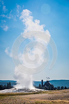 Old Faithful Geyser Erupting at Yellowstone National Park.