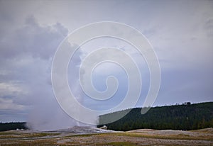 Old faithful geyser eruption in yellowstone national park wyoming