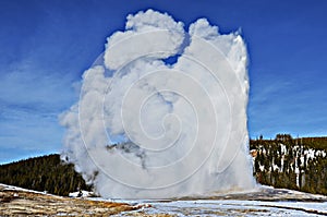 Old Faithful Geyser in the Winter. Yellowstone National Park