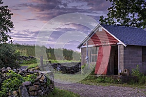 Old farm building at dawn