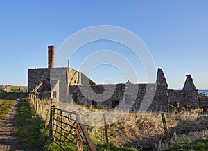 Old Farm Buildings lie abandoned near the East Coast of Scotland at Usan.
