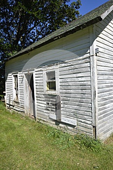 Old farm shed stand idle in a deteriorating state