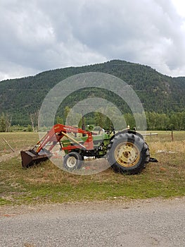 Old Farm Tractor by the Road