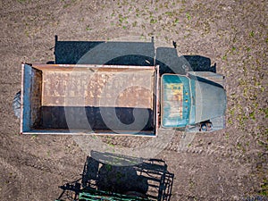 Old farm truck. Aerial top down drone shot.