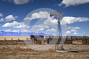 Old Farm With a Windmill During the Day